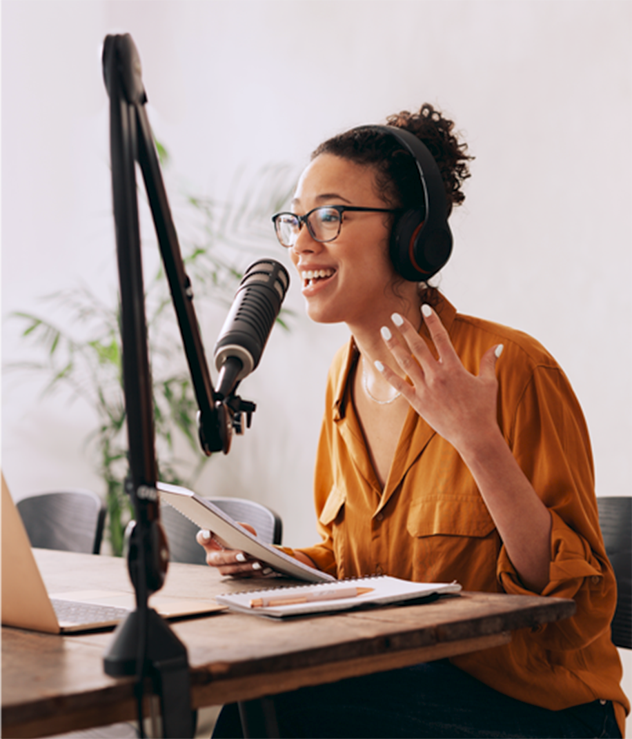 A woman recording a podcast