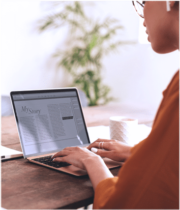 A woman working on a laptop
