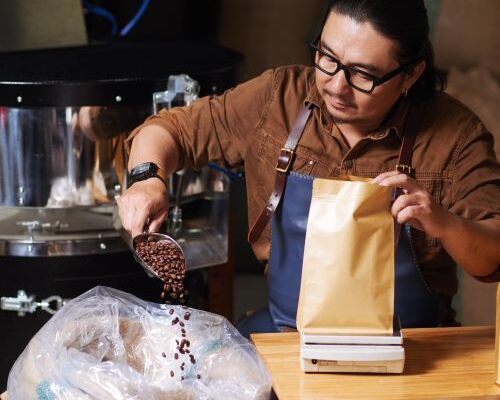 Coffee Shop Owner measuring coffee beans